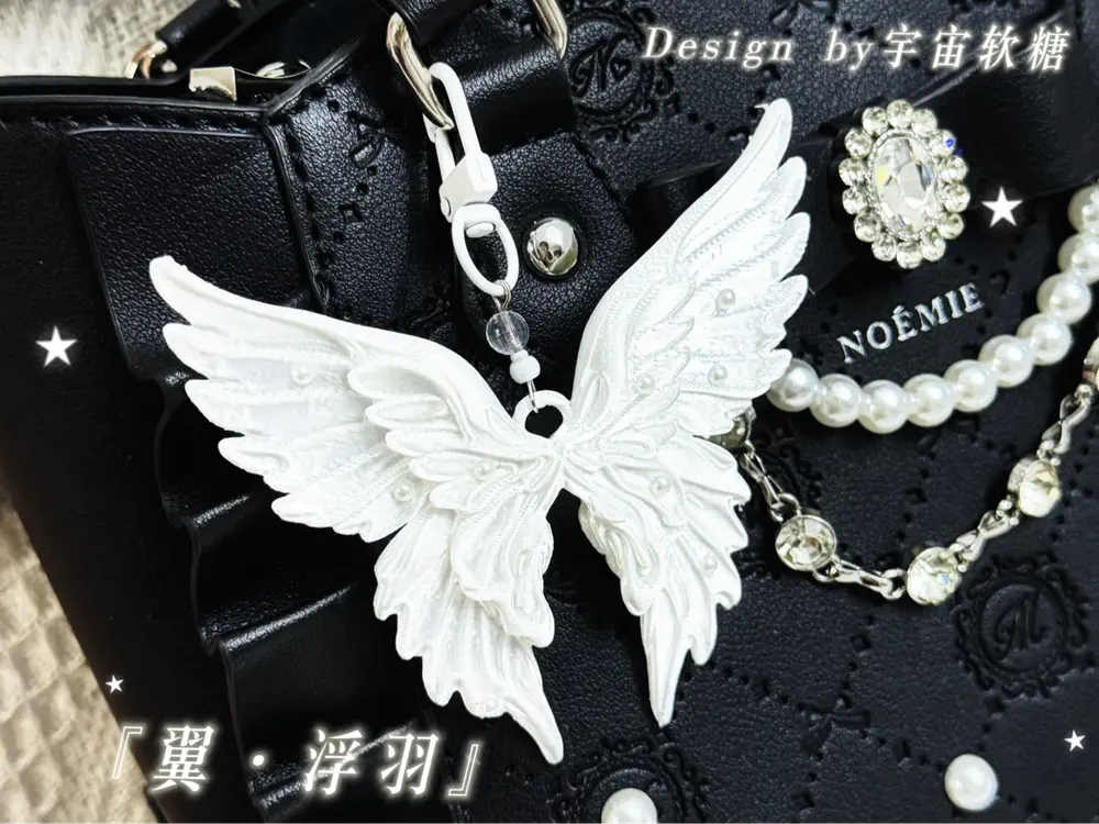 Angel Wings Charm by CosmicGummy