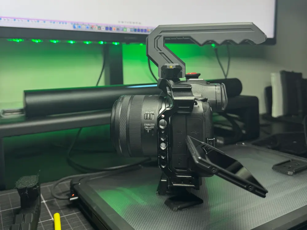 Camera Top Handle Grip by RenderNDeliver