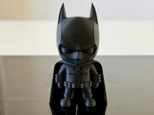 Chibi Dark Knight mini printed in black, front view